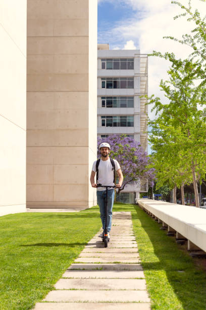 istock Man riding electric scooter 1400334692