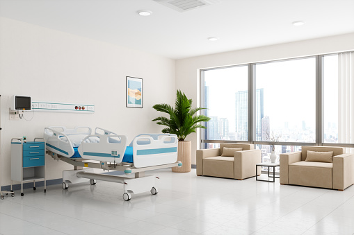 Interior of a modern luxury hospital room with city view.