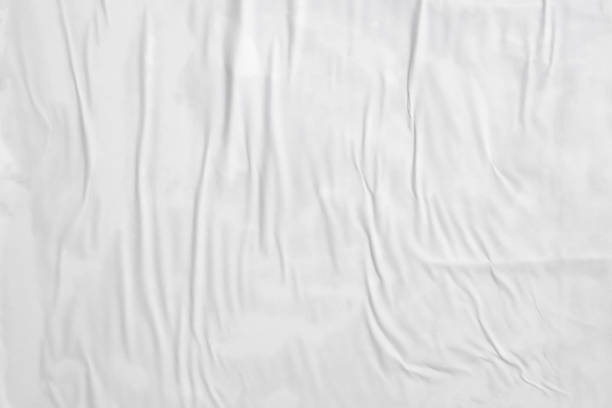 istock white crumpled and creased paper poster texture background 1400338749