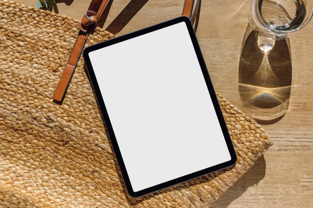 istock Tablet mock-up top view, natural sunlight 1400339411