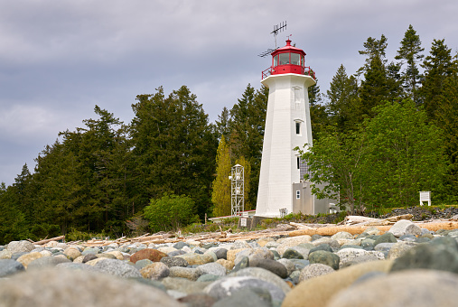 The historic Cape Mudge Lighthouse on Quadra Island overlooking Discovery Passage and Campbell River. BC, Canada.