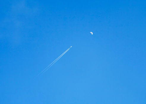Moon and contrails, blue background material