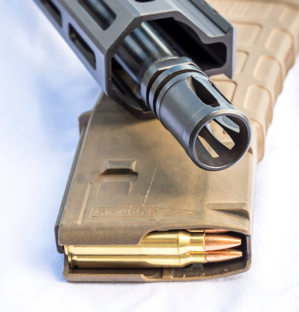 istock A loaded magazine and the muzzle of an AR 15 1400348081