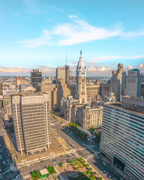 Iconic Philadelphia City Hall On A Sunny Afternoon Philadelphia City Hall close to sunset as the warm tones settle in on it and the other iconic buildings in Center City Philly as seen from this drone aerial point of view real estate outdoors vertical usa stock pictures, royalty-free photos & images