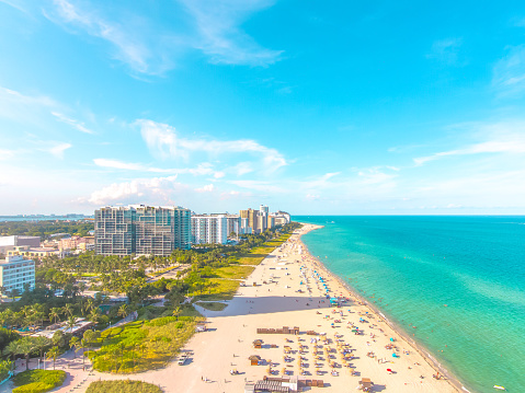 Aerial drone point of view of a popular Miami Beach area as residents and tourists enjoy a nice warm summer afternoon