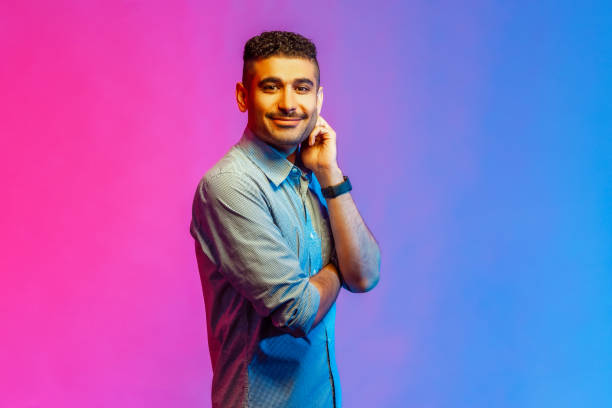 istock Man in shirt standing looking at camera with happy positive facial expression. 1400355667