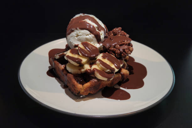 istock Chocolate banana waffles with ice cream 1400358822