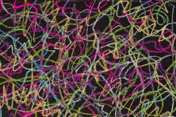 istock colorful doodles on dark background texture 1400358996