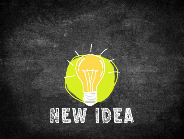 istock New idea and light bulb handwriting on blackboard. 1400363167