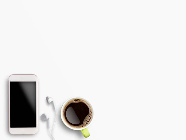 istock Top view with smartphone and black coffee cup isolated on white background. 1400364181