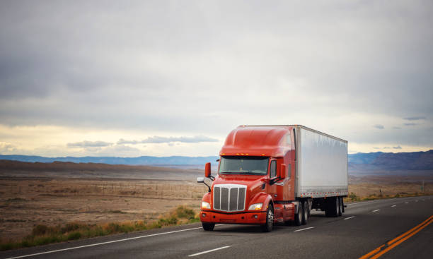 istock Refrigerated red semi trailer transporting commercial cargo - USA 1400368478