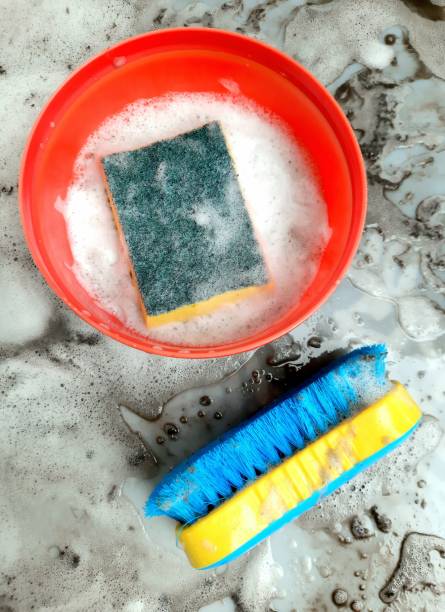 istock Cleaning Brush - dirty and dusty detergent foam background. 1400372350