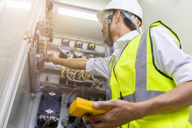 Male engineer checking electrical system with electronic equipment Male engineer checking electrical system with electronic equipment foul stock pictures, royalty-free photos & images