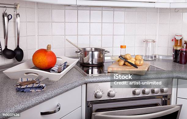 Cooking In A Modern Kitchen Stock Photo - Download Image Now - Open, Wooden Spoon, Burner - Stove Top