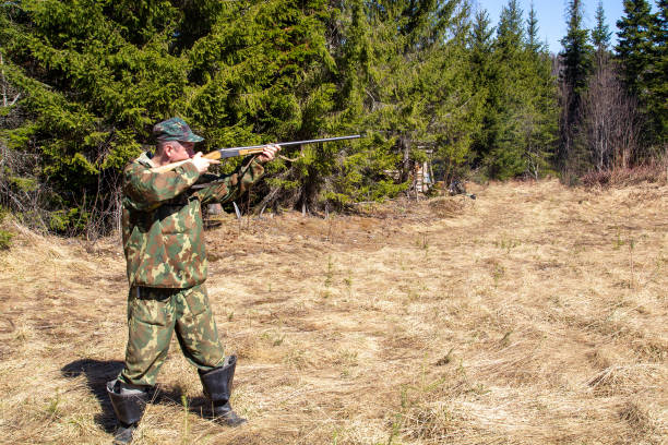 istock The hunter is aiming at the gun 1400375082