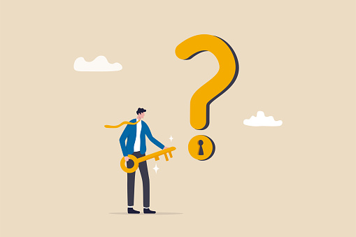 Key to unlock answer for problem and questions, solution or reason to solve problem, wisdom or understanding concept, smart businessman holding golden key to unlock keyhole on question mark sign.