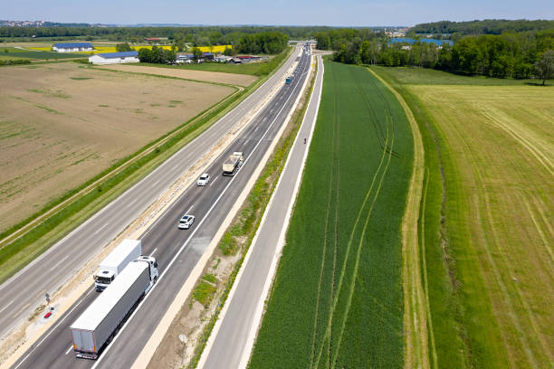 istock Highway with Trucks in Rural Area, Aerial View 1400379414