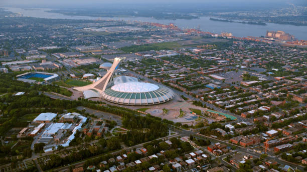 Montreal, CA / USA - August 07, 2019: Aerial view of Olympic Stadium in Montreal, Quebec, Canada.Olympic Stadium is a multi-purpose stadium in Montreal, Canada, located at Olympic Park in the Hochelaga-Maisonneuve district of the city. Montreal Olympic Stadium was built in the 1970s to serve as the flagship venue of the 1976 Summer Olympics.
