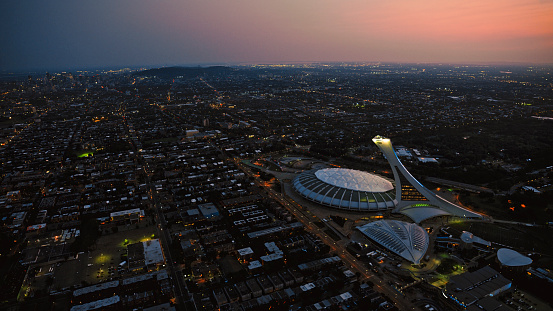 Montreal, CA / USA - August 07, 2019: Aerial view of Olympic Stadium at dusk, Montreal, Quebec, Canada.

Olympic Stadium is a multi-purpose stadium in Montreal, Canada, located at Olympic Park in the Hochelaga-Maisonneuve district of the city. Montreal Olympic Stadium was built in the 1970s to serve as the flagship venue of the 1976 Summer Olympics.