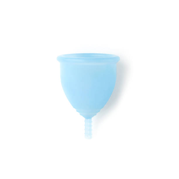 Blue menstrual cup isolated on white background. Female intimate hygiene. Women health concept, eco-friendly, zero waste alternatives stock photo