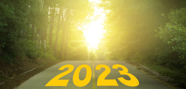 istock Word 2023 written on forested rural road. 1400384229