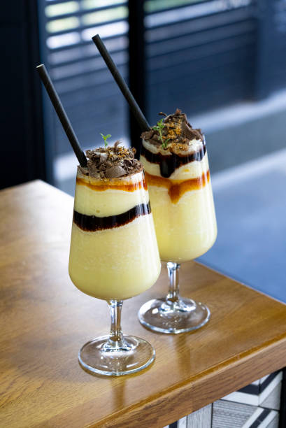 istock Two ice-cold milkshakes and unique summer vacation fun. 1400385447