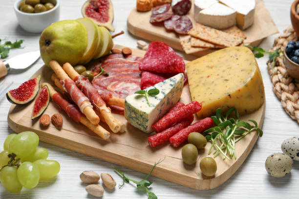 istock Set of different delicious appetizers served on white wooden table 1400391077