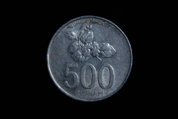istock Close up 500 rupiah with Jasmine flower (Jasminum sambac) 1400391086