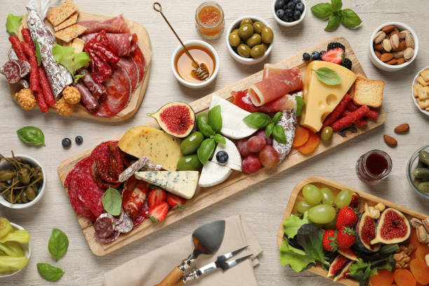istock Set of different delicious appetizers served on white wooden table, flat lay 1400391146