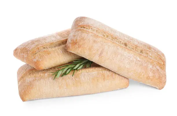 Crispy ciabattas with rosemary isolated on white. Fresh bread