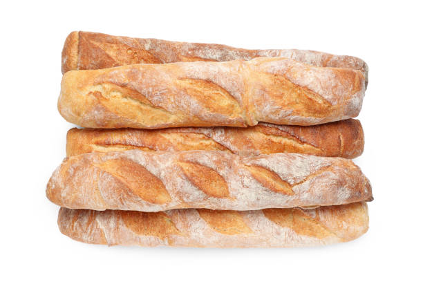 istock Crispy French baguettes on white background, top view. Fresh bread 1400391578