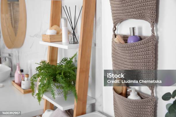 Knitted Organizer Hanging On Wall In Bathroom Stock Photo - Download Image Now - Bathroom, Storage Compartment, Shelf