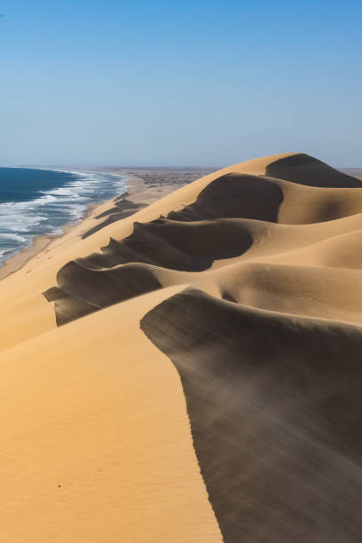 istock Namibia, the Namib desert, falling into the sea 1400393871