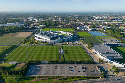 Novara, Italy – May 7, 2019: Empty football stadium seen from the parking lot in front. Stadio Silvio Piola, street John Fitzgerald Kennedy, hosts about 18,000 spectators