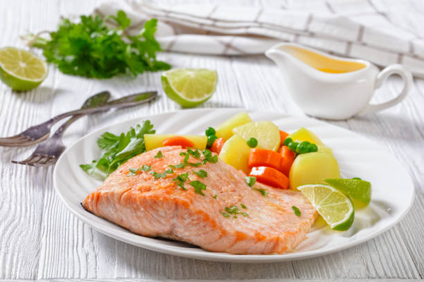 istock Multi Cooker salmon, carrots, peas and potatoes 1400400769