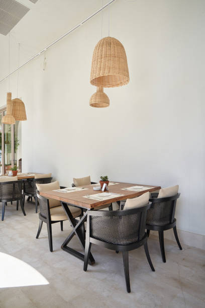 istock Empty wooden table in an eco-style restaurant 1400400789