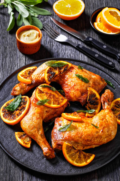 istock Grilled Orange roast Chicken legs with sage 1400400873