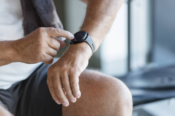 istock Active senior exercising in a gym 1400403758