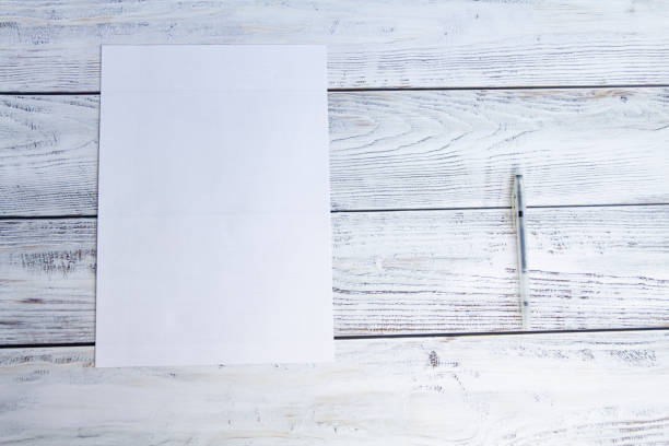 istock Office supplies for work, sales and study on a wooden background. 1400403796