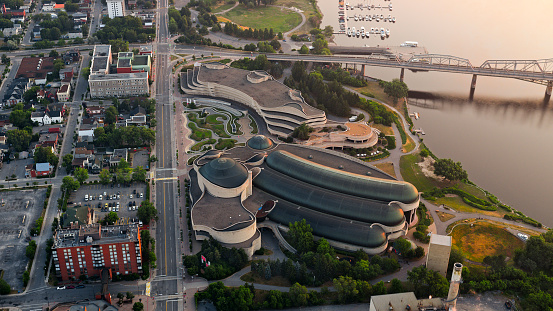 Gatineau, CA / USA - August 07, 2019: Aerial view of Canadian Museum of History in city of Gatineau, Quebec, Canada.\n\nThe Canadian Museum of History is a national museum on anthropology, Canadian history, cultural studies, and ethnology in Gatineau, Quebec, Canada. It is one of Canada’s oldest public institutions.