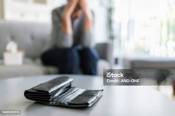 Elderly Woman Unhappy With The Rising Cost Of Living Stock Photo - Download Image Now