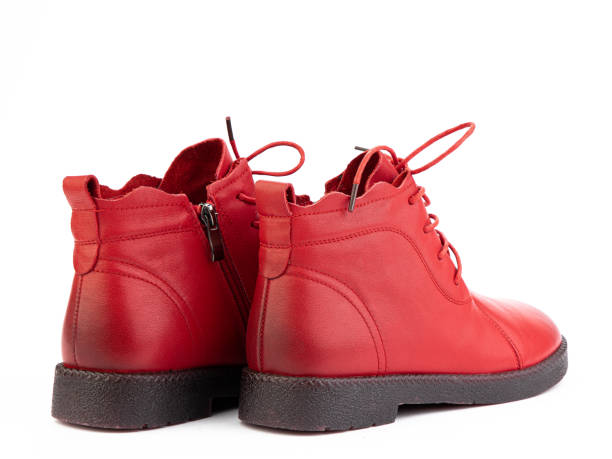 istock Women's autumn red leather jodhpur boots with black sole isolated on white background. Back side view. Fashion shoes. Photoshoot for shoe shop concept 1400404255
