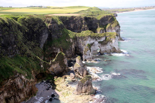 istock Rugged coast at Dunluce Castle in Northern Ireland 1400406504