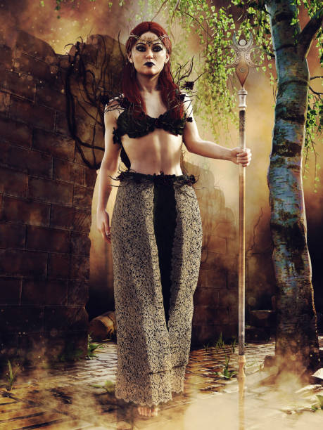 istock Fairy sorceress with a staff by a tree 1400407382