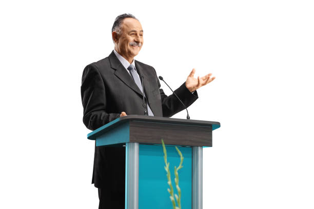 istock Politician giving a speech on a podium and smiling 1400407528