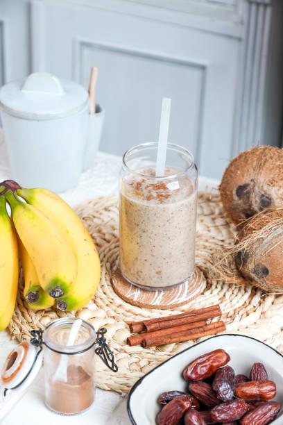istock White Smoothie healthy drink with Banana and Coconut in rustic kitchen 1400409800