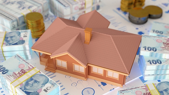 Housing Cost and Mortgage in Turkey Concept House with Turkish Lira Banknotes. 3D Render