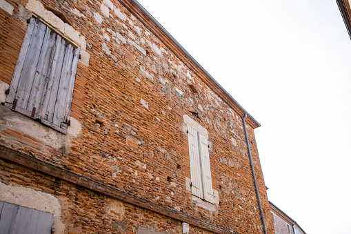 Door features of apartments along the streets of Monticchiello in Tuscany Italy