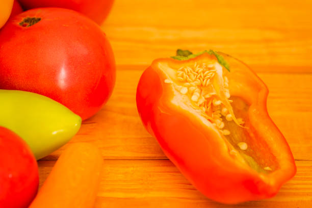 one fresh red tomato isolated on white