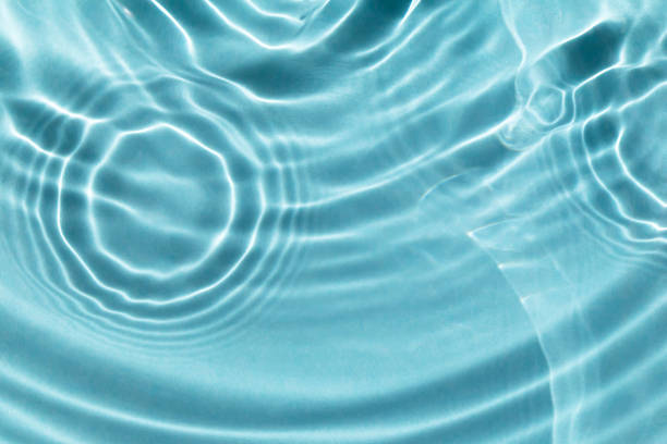 istock Sun glare on water waves 1400422627